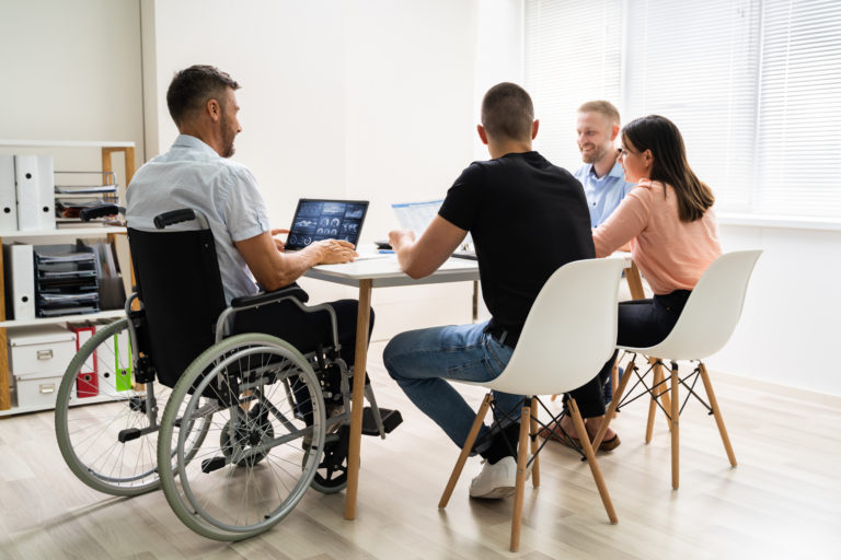Disabled,People,In,Wheelchair,At,Workplace,Business,Meeting